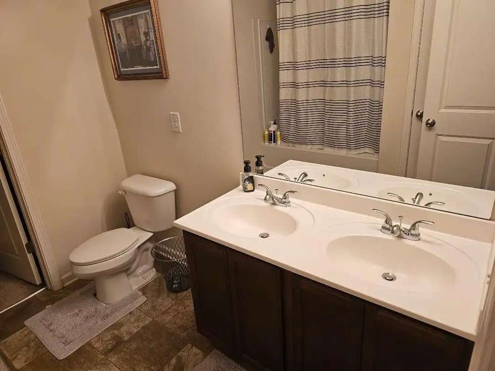 A sanitized, spotless bathroom after service.
