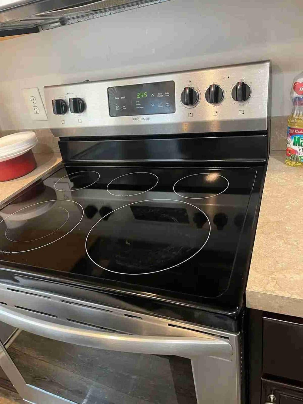 A wiped-down kitchen appliance and clean counter surface.