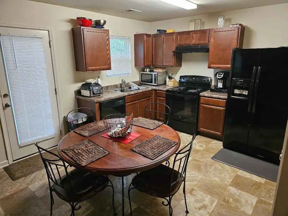 A clean, tidy residential kitchen after service.